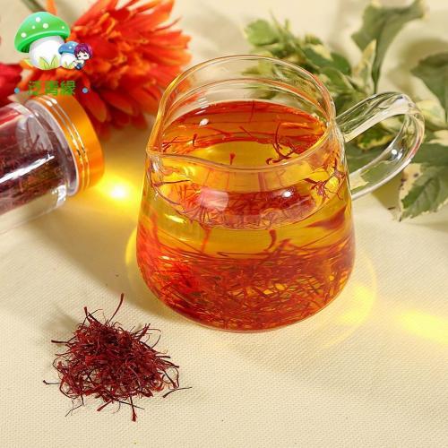 Saffron and Rose water in glass container